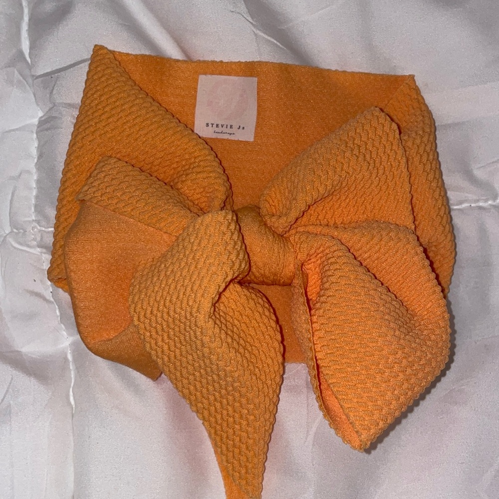 Baby girl orange bow